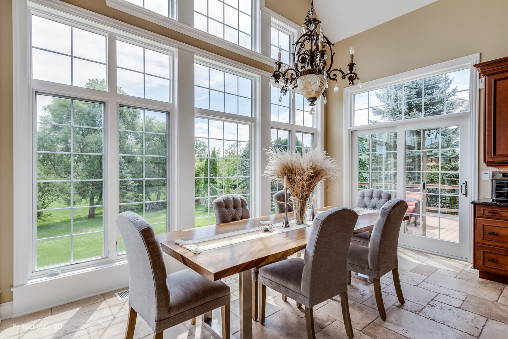 1235 MacAlpin Drive Inverness, IL 60010 - Photo 5 of 20 a view of a dining room with furniture large windows and wooden floor