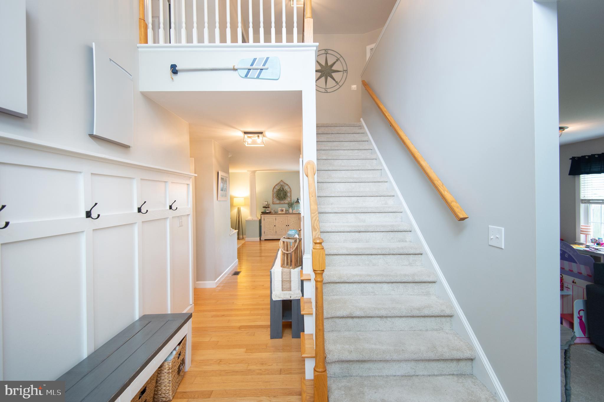 10 Shawnee Road Cambridge, MD 21613 - Photo 11 of 72 2-story foyer with hardwood flooring