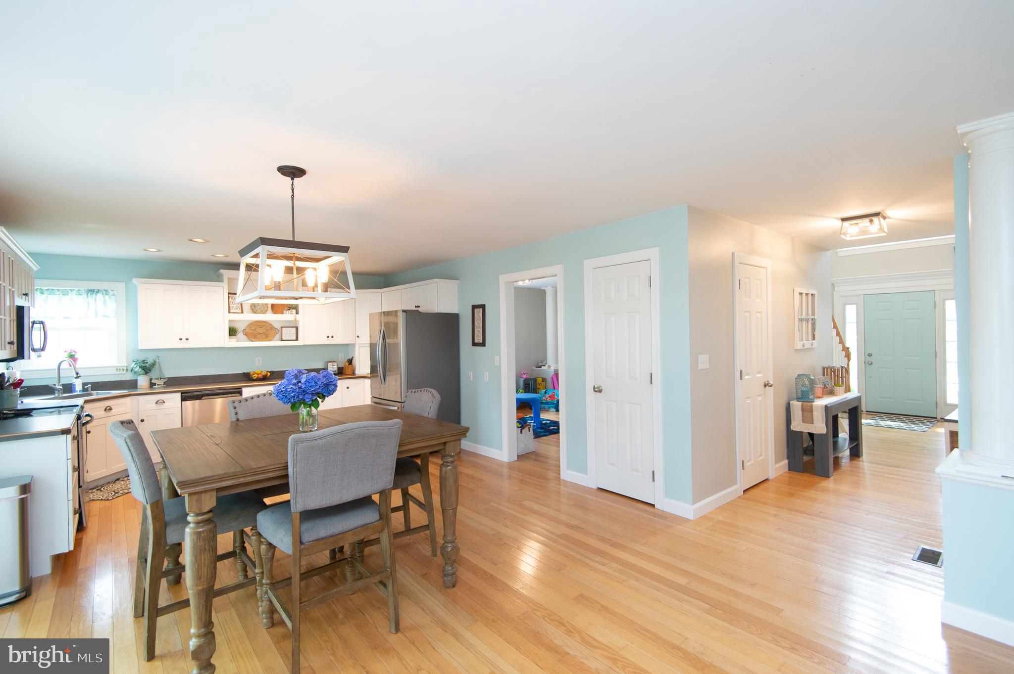10 Shawnee Road Cambridge, MD 21613 - Photo 17 of 72 Hardwood floors and cool blue color is welcoming