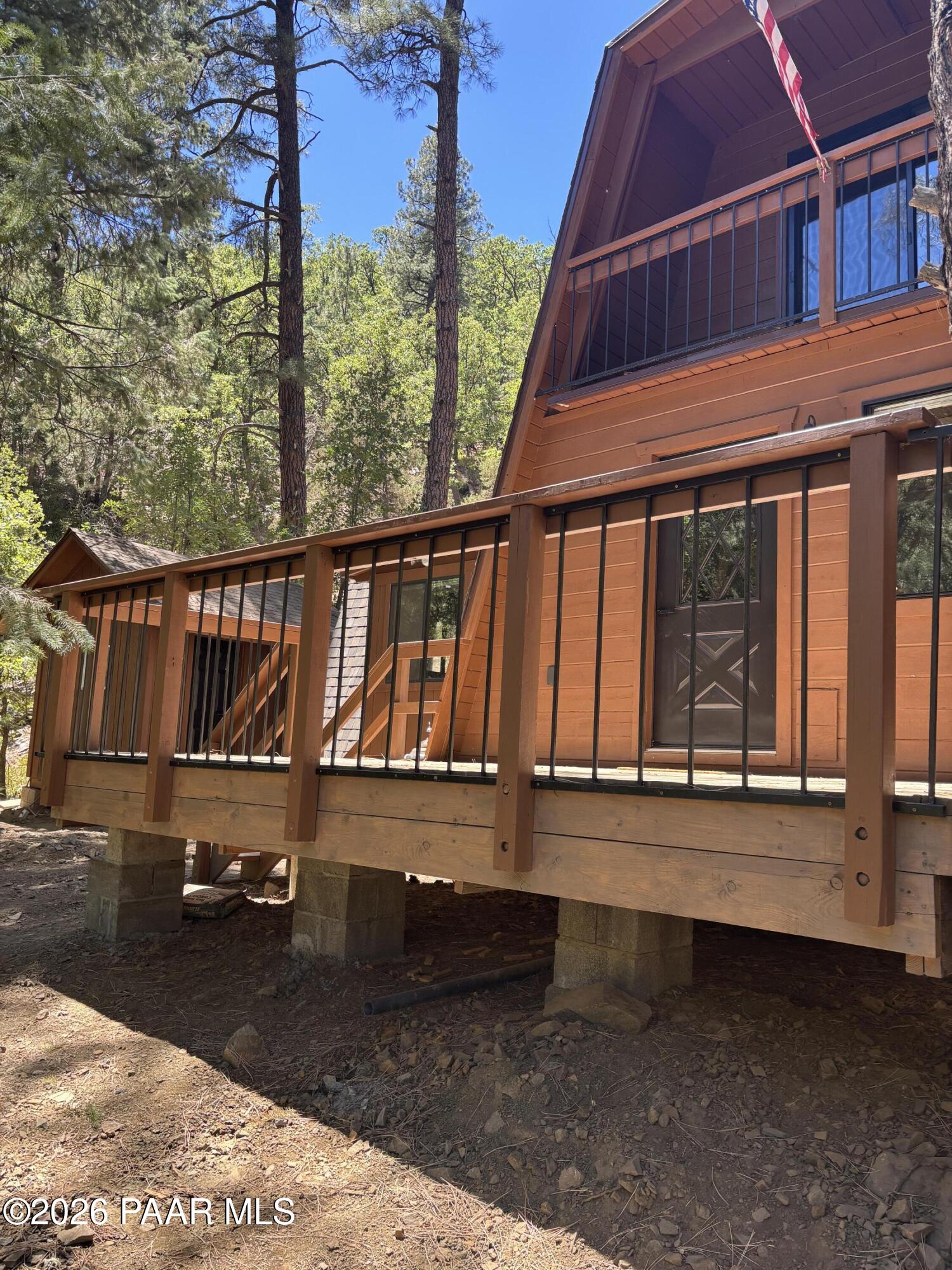 8550 South Breezy Pine Road Mayer, AZ 86333 - Photo 2 of 40 a view of a roof deck with large tree