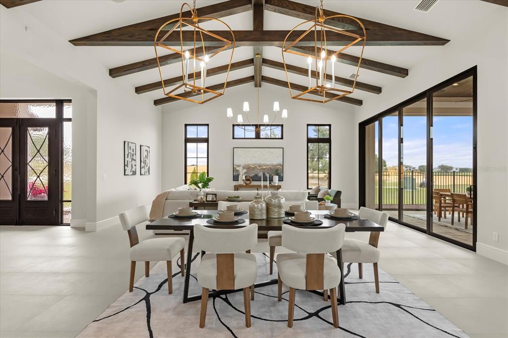 16001 Volterra Point Bella Collina, FL 34756 - Photo 11 of 47 a view of a dining room with furniture window and outside view