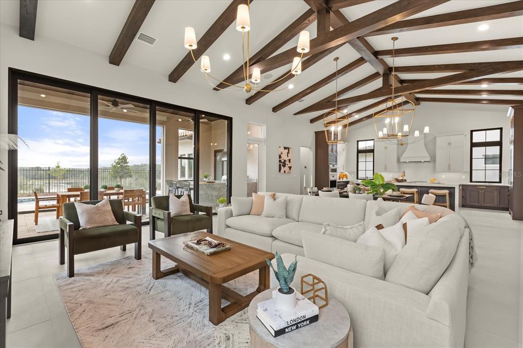 16001 Volterra Point Bella Collina, FL 34756 - Photo 12 of 47 a living room with furniture and a large window