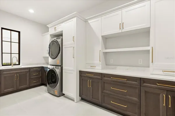 a bathroom with a tub shower and mirror