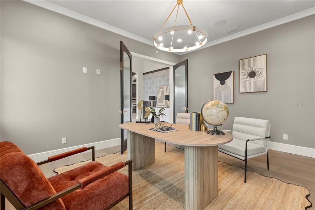 16001 Volterra Point Bella Collina, FL 34756 - Photo 20 of 47 a view of a dining room with furniture and wooden floor
