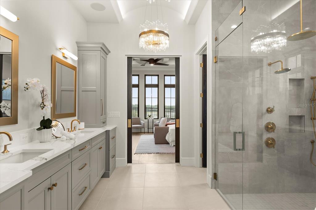 16001 Volterra Point Bella Collina, FL 34756 - Photo 28 of 47 a spacious bathroom with a double vanity sink mirror and shower