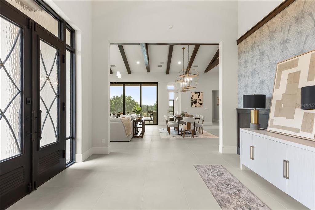 16001 Volterra Point Bella Collina, FL 34756 - Photo 8 of 47 a view of a livingroom with furniture and a flat screen tv