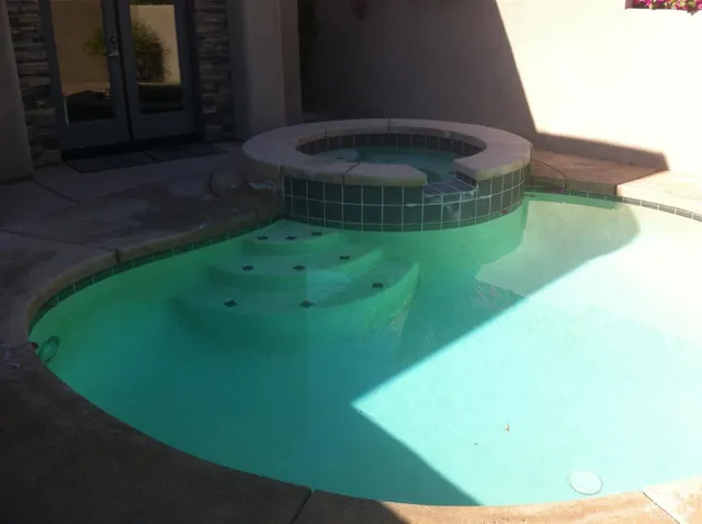 a bathroom with a sink and toilet