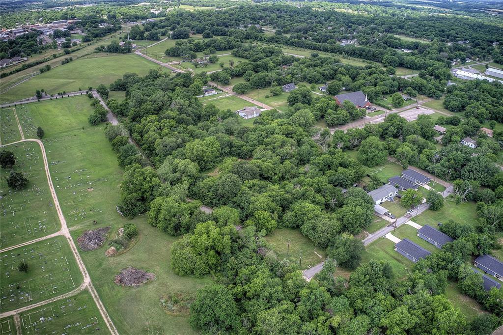 0 Sycamore Street Commerce, TX 75428 - Photo 5 of 14 an aerial view of a house with a yard
