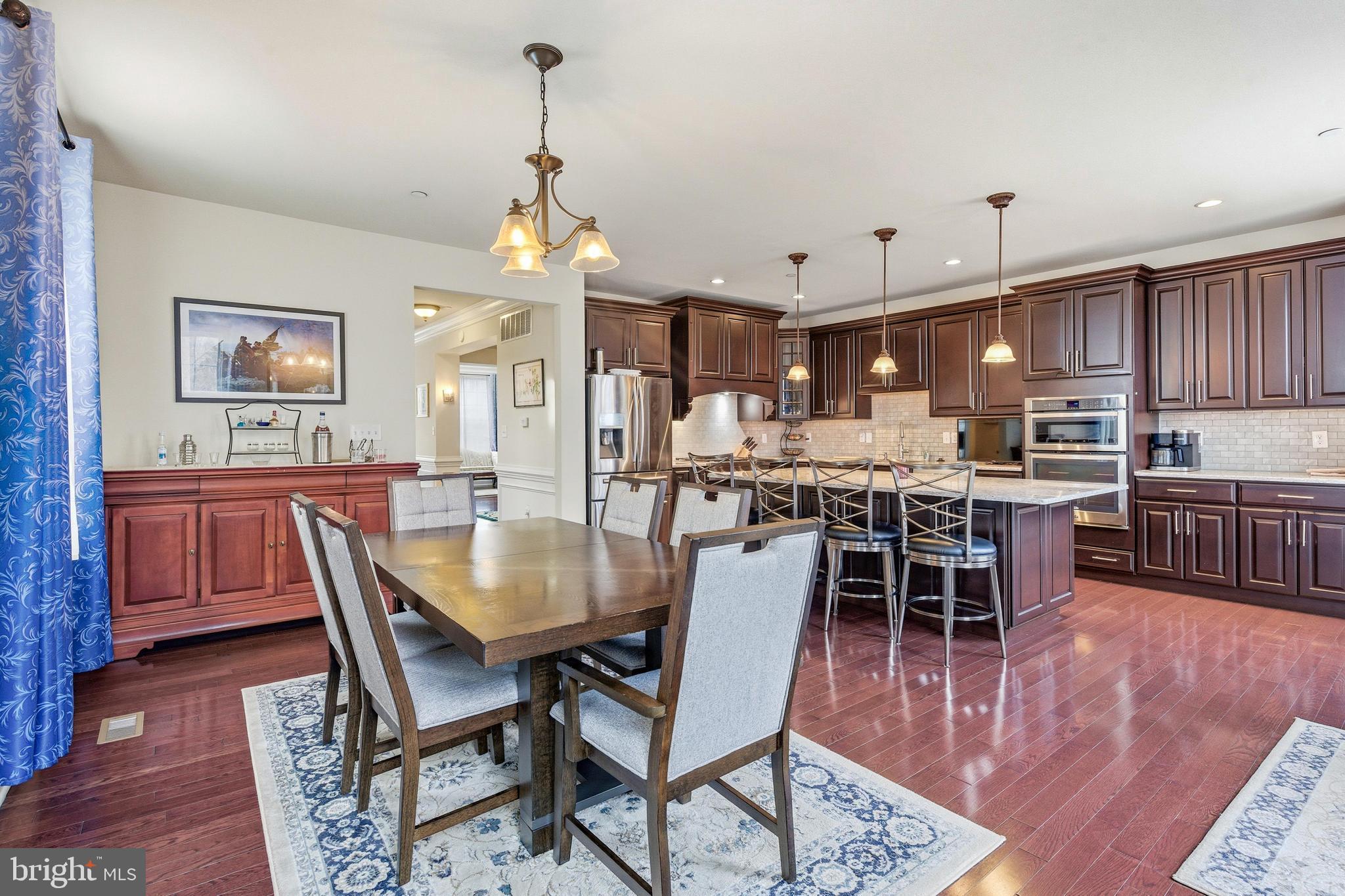 309 Corvus Circle Springfield, PA 19064 - Photo 12 of 34 a view of a dining room with furniture and wooden floor