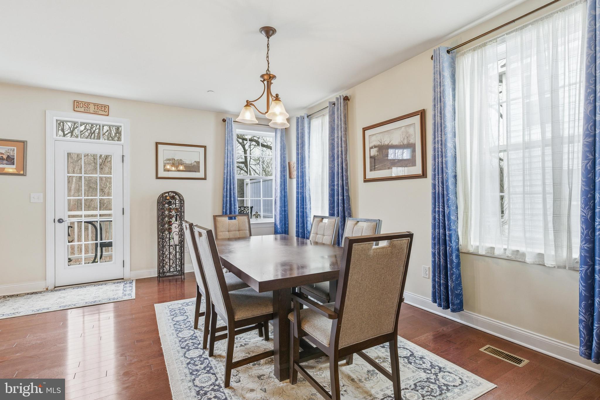 309 Corvus Circle Springfield, PA 19064 - Photo 13 of 34 a view of a dining room with furniture window and wooden floor