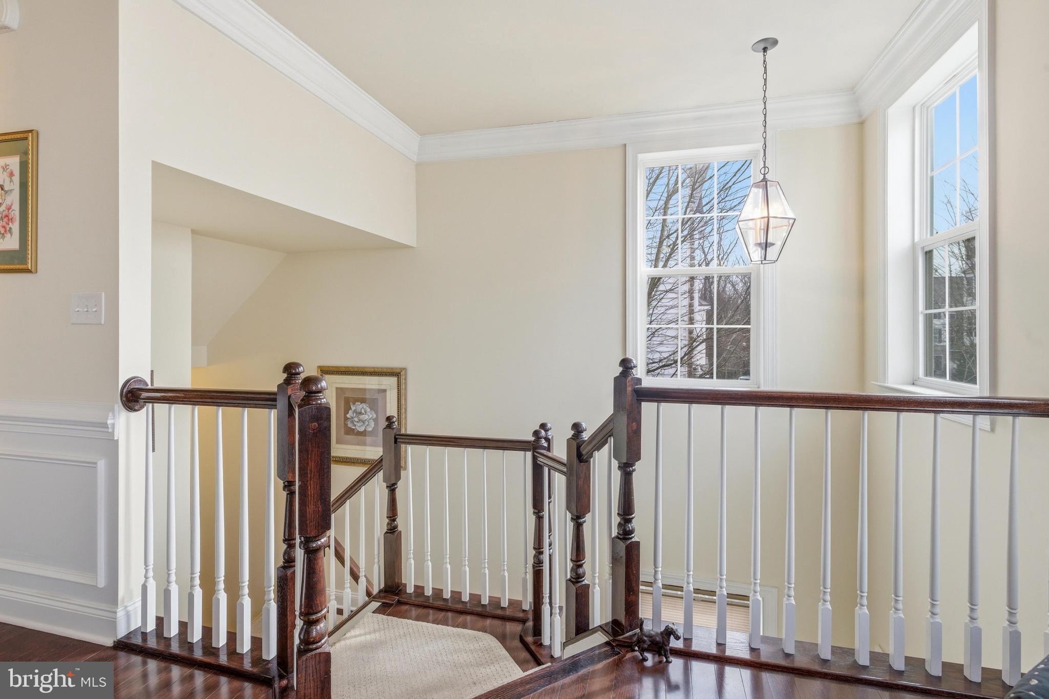 309 Corvus Circle Springfield, PA 19064 - Photo 14 of 34 a view of a hallway with windows and stairs