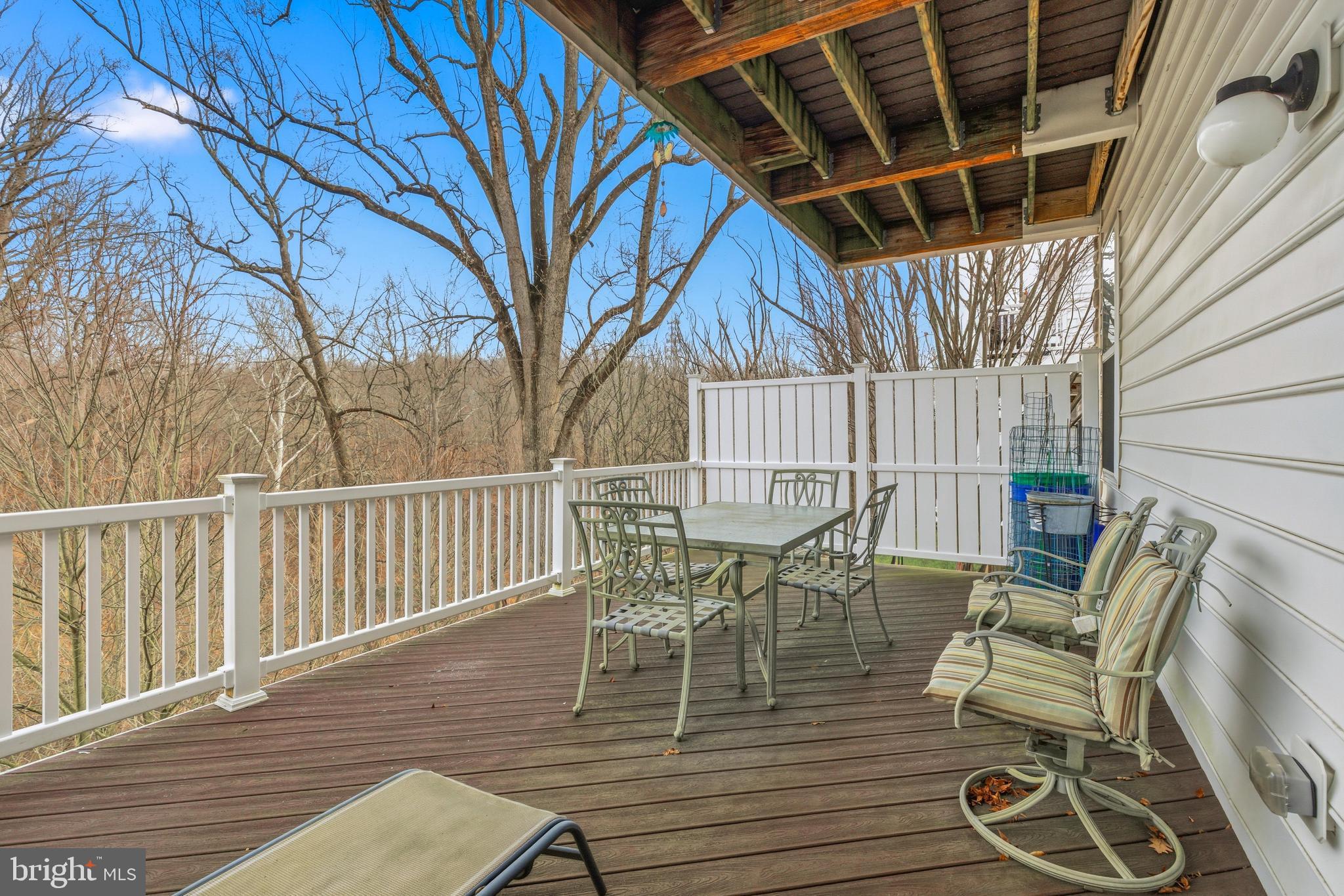 309 Corvus Circle Springfield, PA 19064 - Photo 29 of 34 a view of a chairs and table on the deck