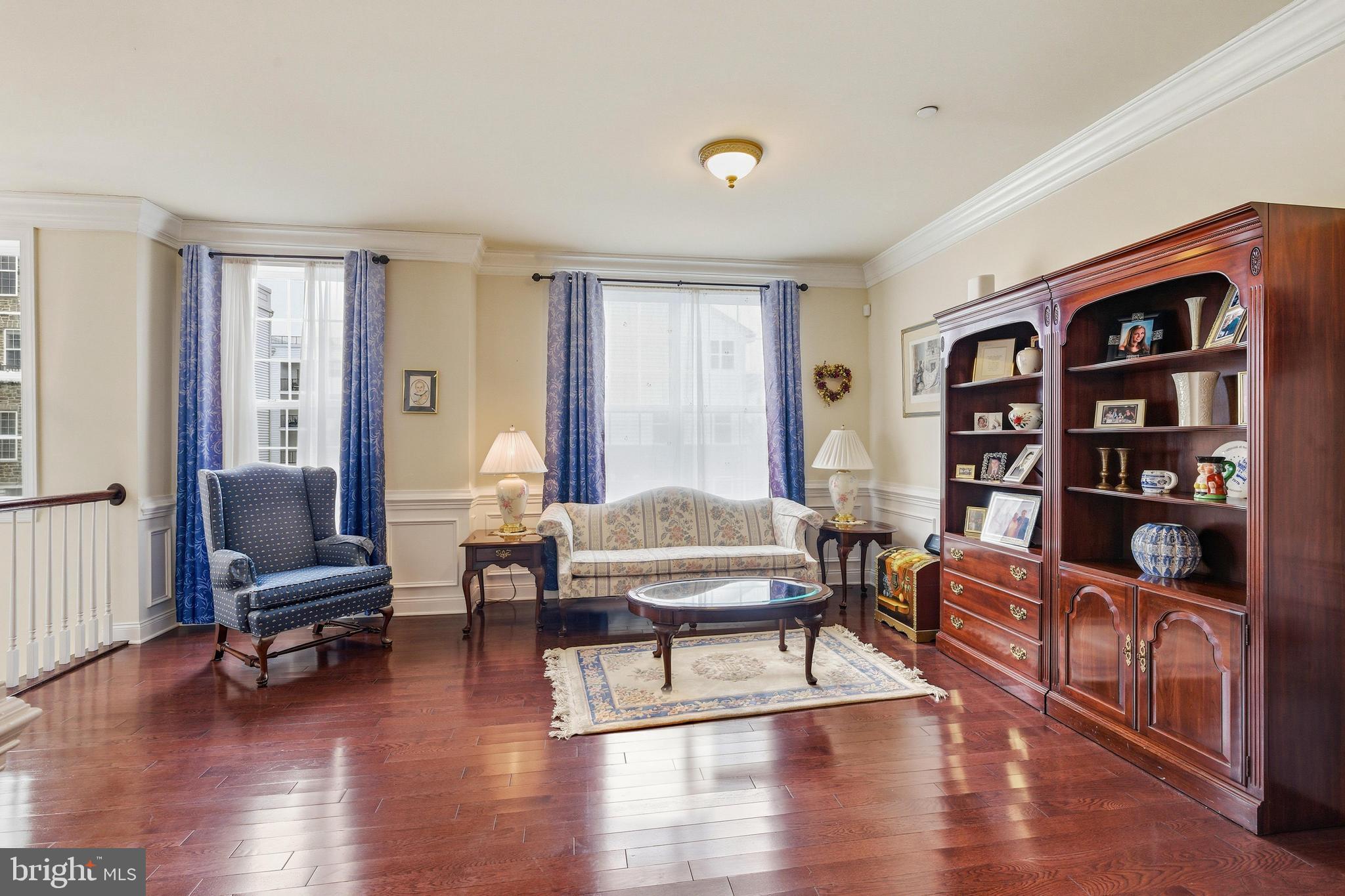 309 Corvus Circle Springfield, PA 19064 - Photo 4 of 34 a living room with furniture and a book shelf
