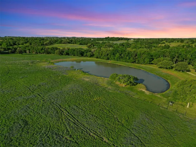 a living room with furniture and a clock