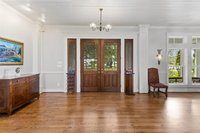 a kitchen with granite countertop a refrigerator and a sink