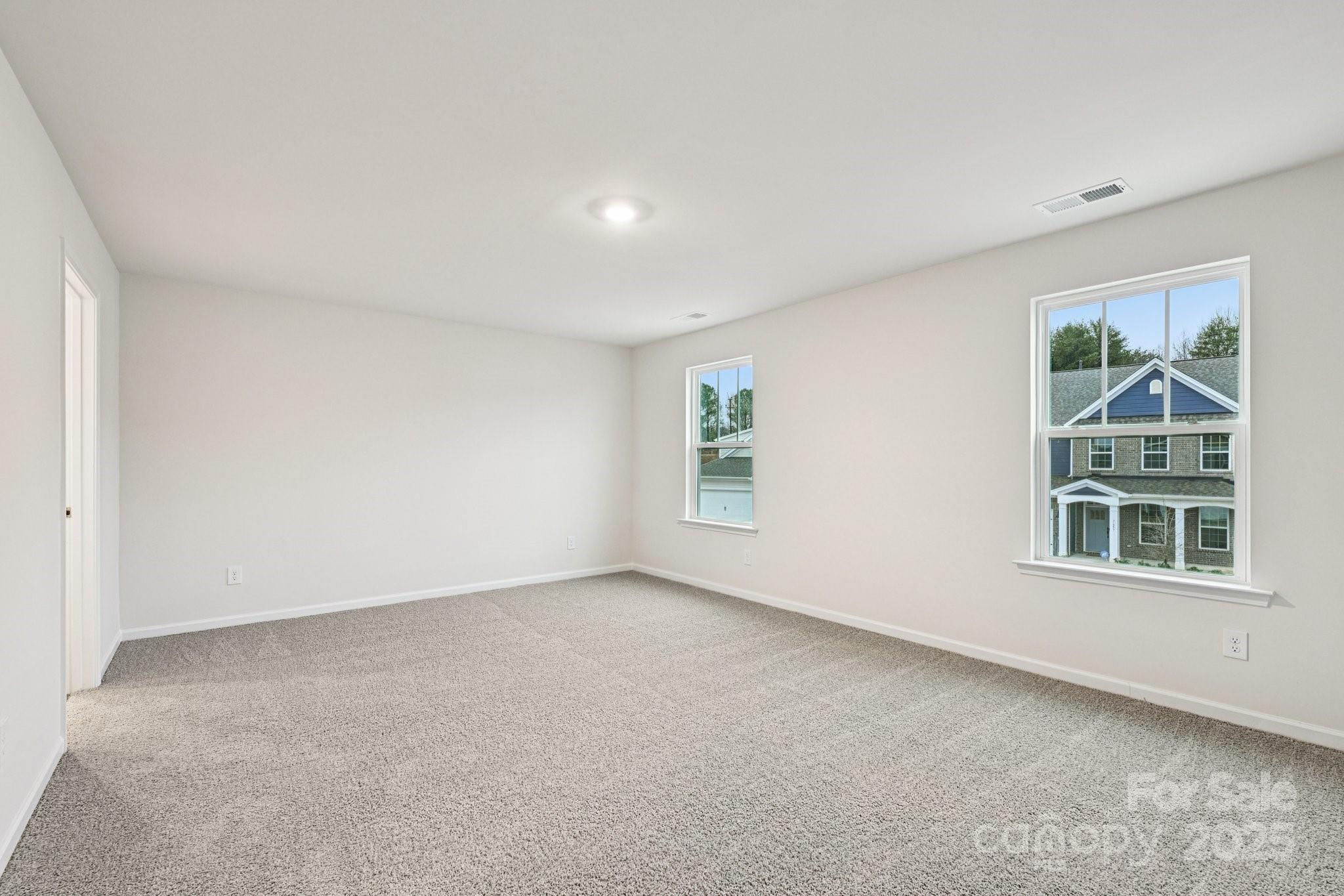 7648 Bainbridge Road Sherrills Ford, NC 28673 - Photo 12 of 25 an empty room with windows