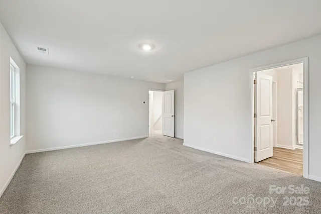 an empty room with a natural light