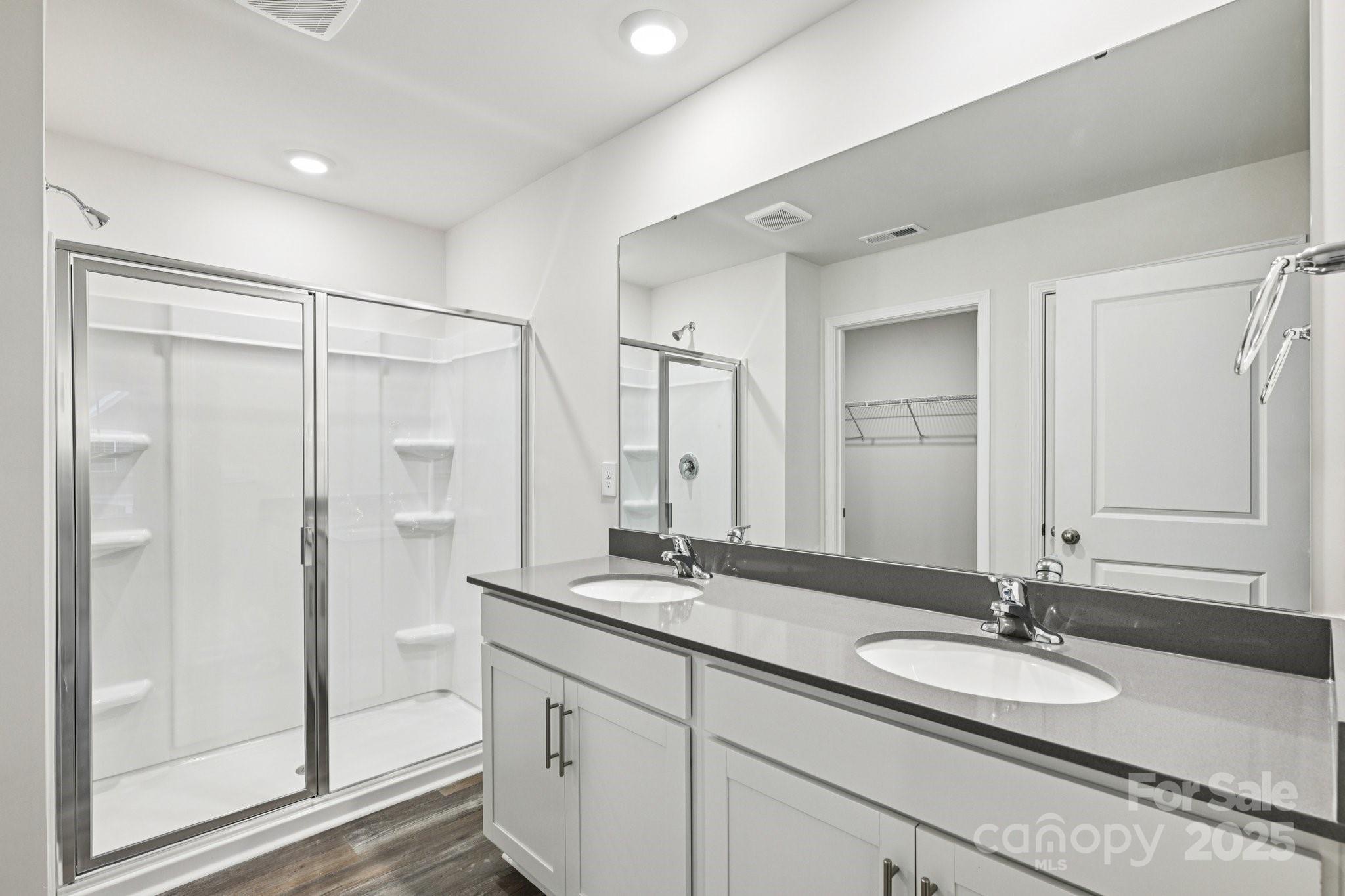 7648 Bainbridge Road Sherrills Ford, NC 28673 - Photo 15 of 25 a bathroom with a granite countertop sink and a mirror