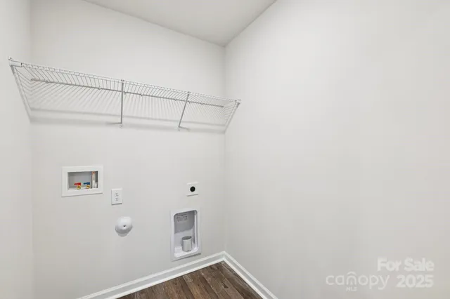 a view of a small space with racks on the wall