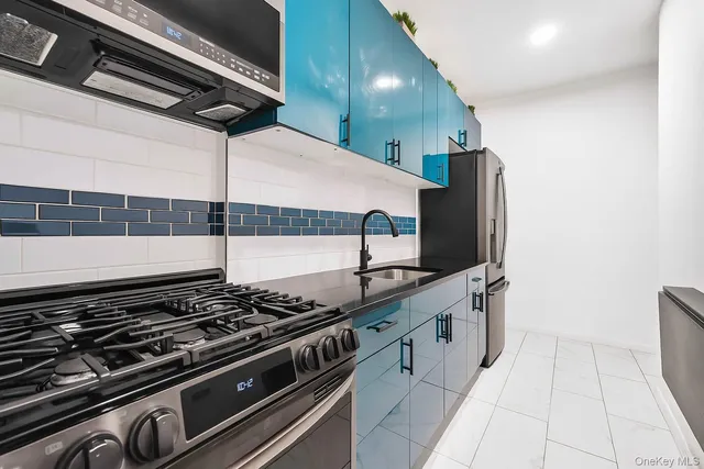 a bathroom with a sink a mirror and a bathtub