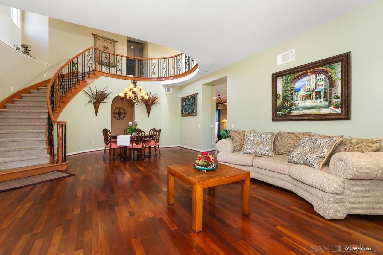 16290 Deer Ridge Road San Diego, CA 92127 - Photo 22 of 36 a living room with furniture and wooden floor
