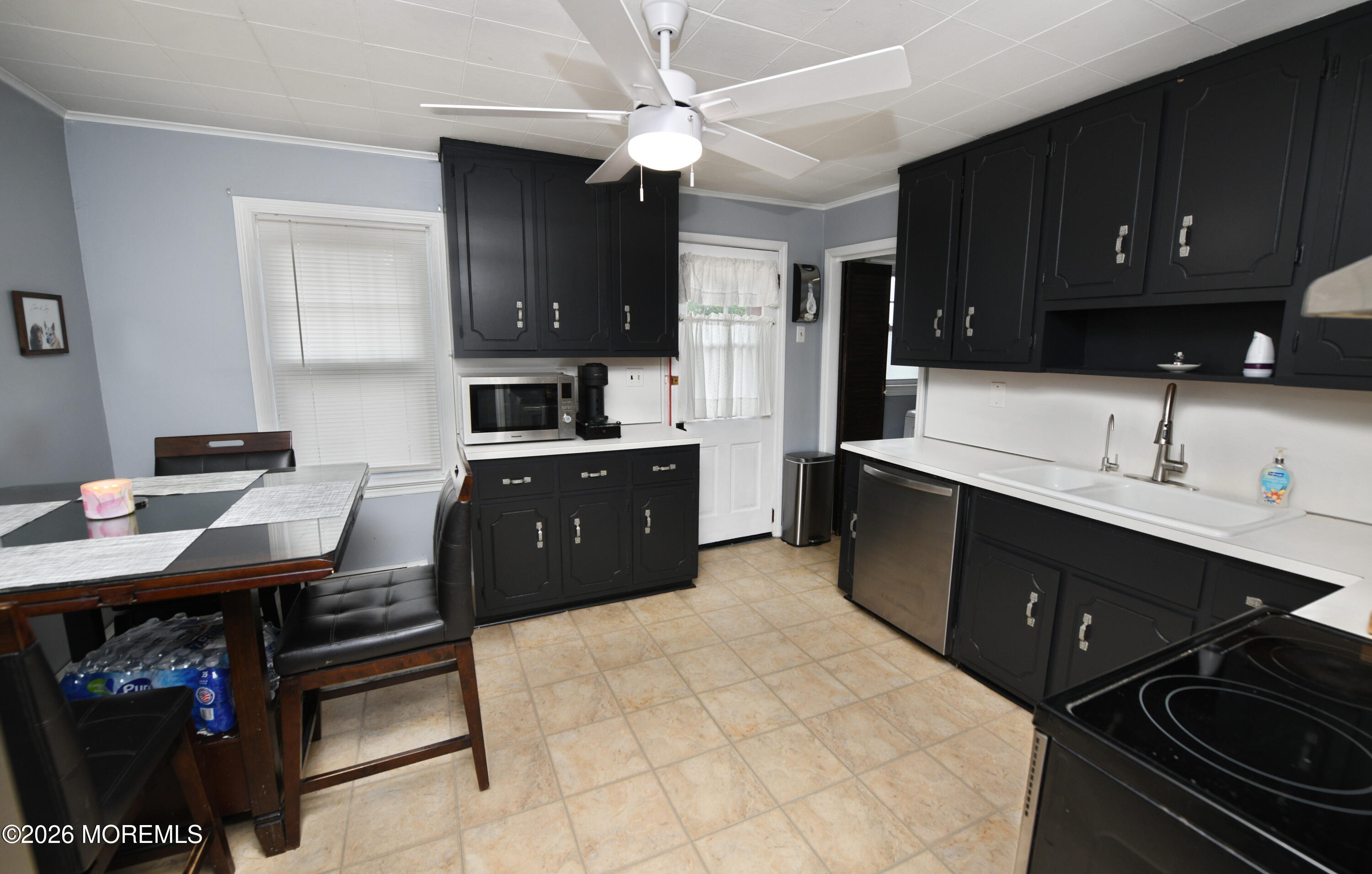 232 Pearce Avenue Point Pleasant, NJ 08742 - Photo 12 of 27 a kitchen with a sink appliances and cabinets