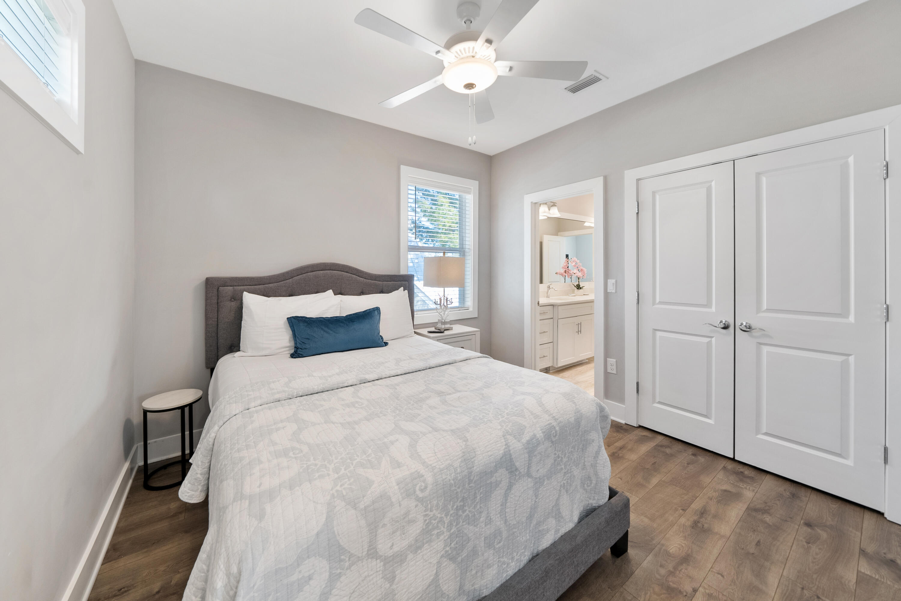 173 West Willow Mist Road Inlet Beach, FL 32461 - Photo 16 of 51 a bedroom with a bed and a chandelier