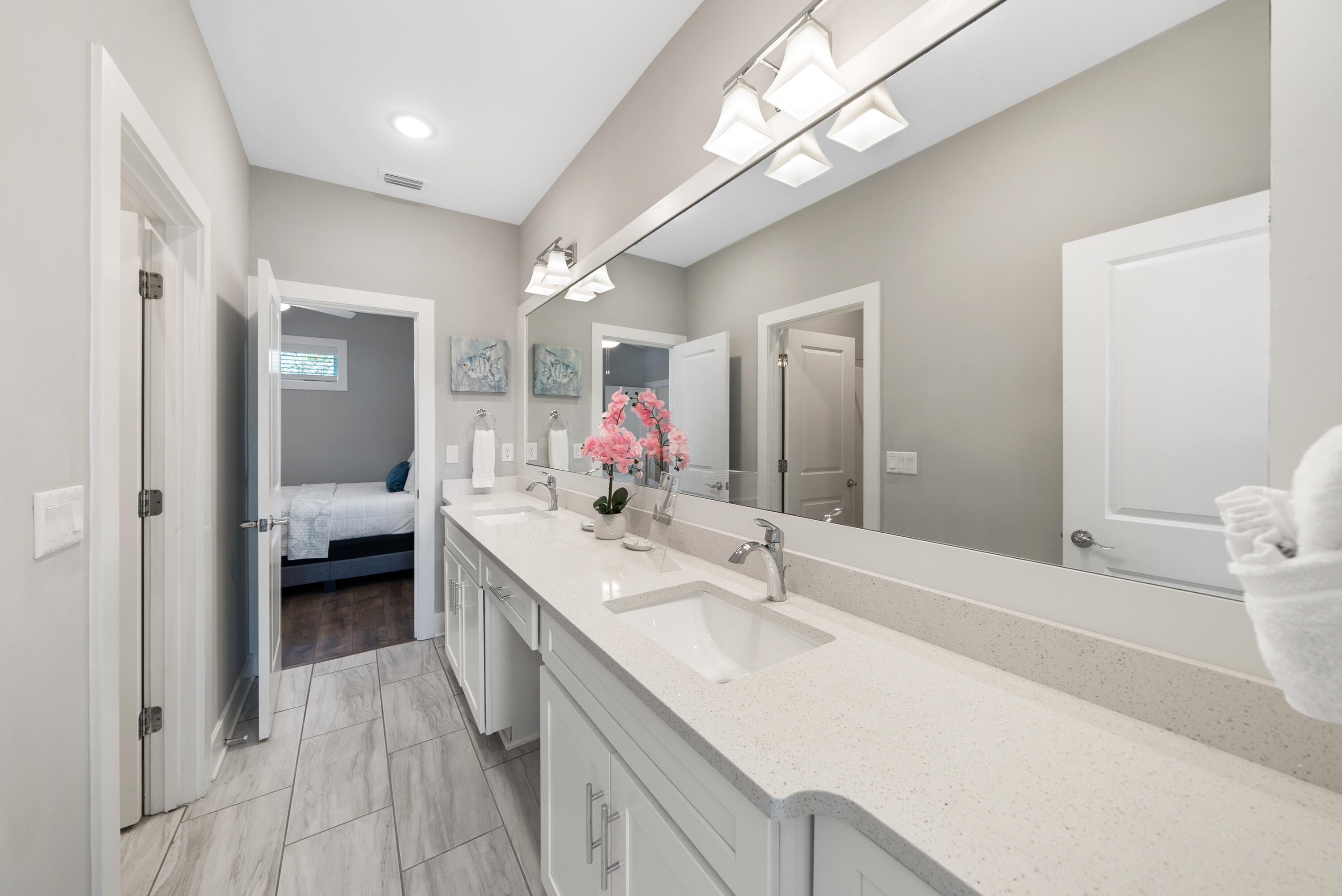 173 West Willow Mist Road Inlet Beach, FL 32461 - Photo 20 of 51 a en suite bathroom with a double vanity sink and a mirror