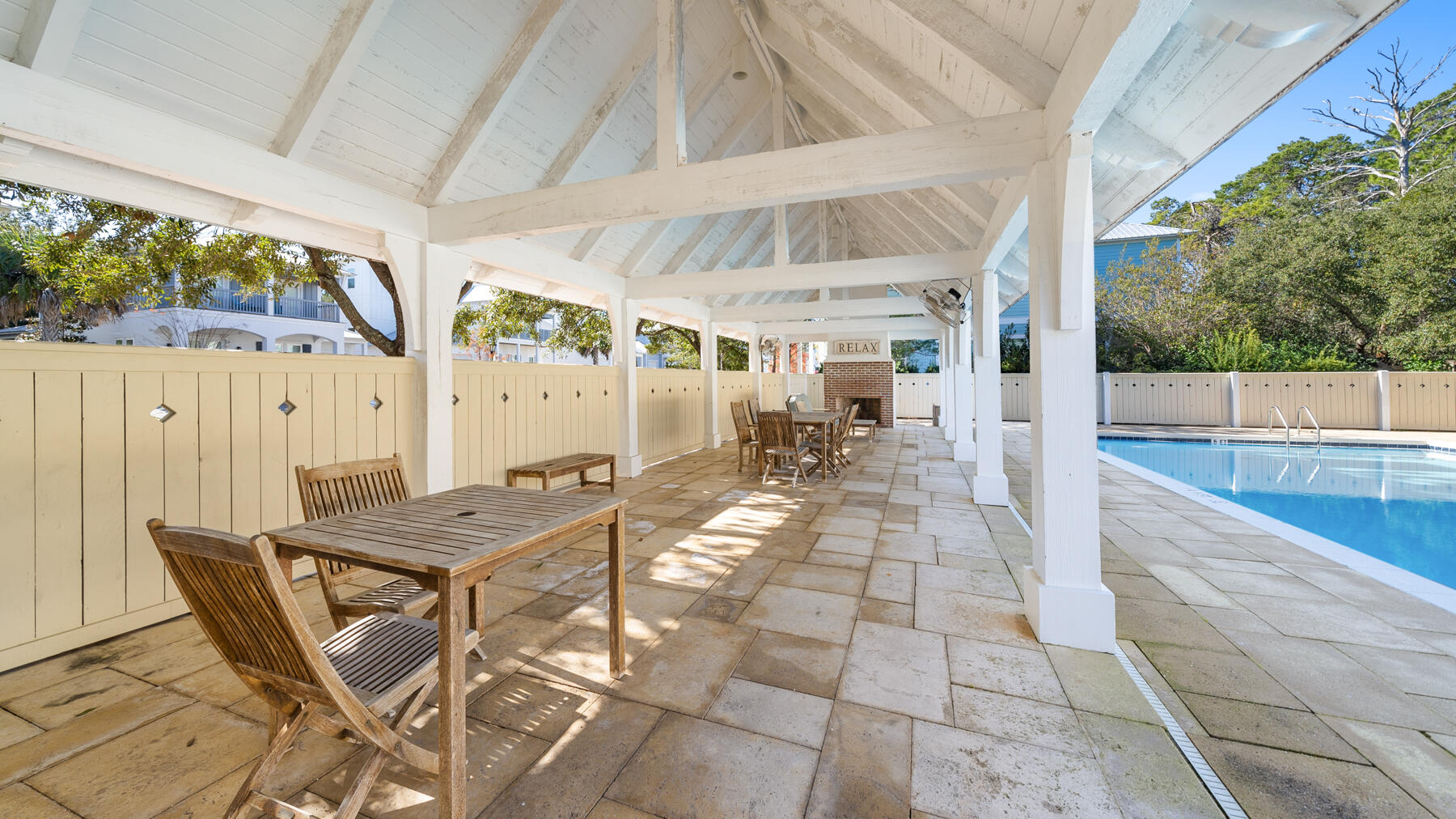 173 West Willow Mist Road Inlet Beach, FL 32461 - Photo 34 of 51 a view of a patio with table and chairs with wooden floor and fence