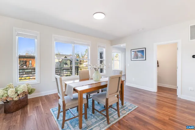 a living room with fireplace furniture and a flat screen tv