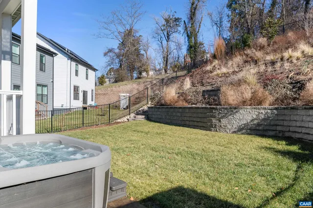 a view of a balcony with wooden floor and city view