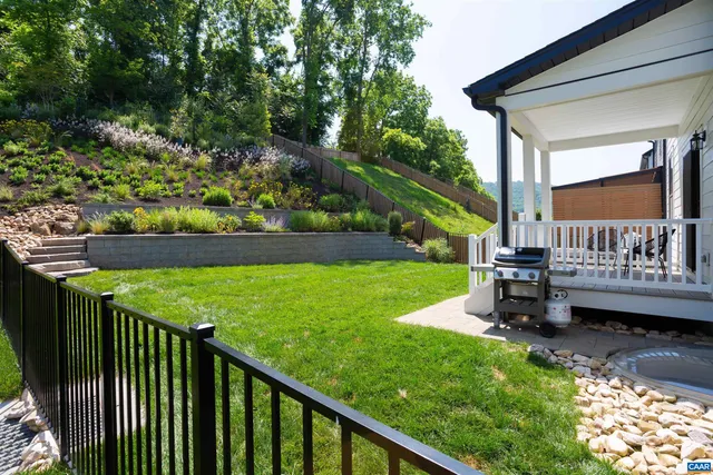 a front view of a house with yard