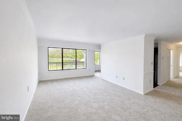 an empty room with windows