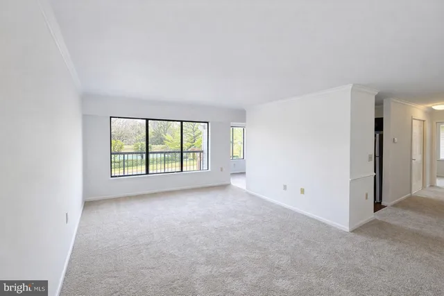 an empty room with windows