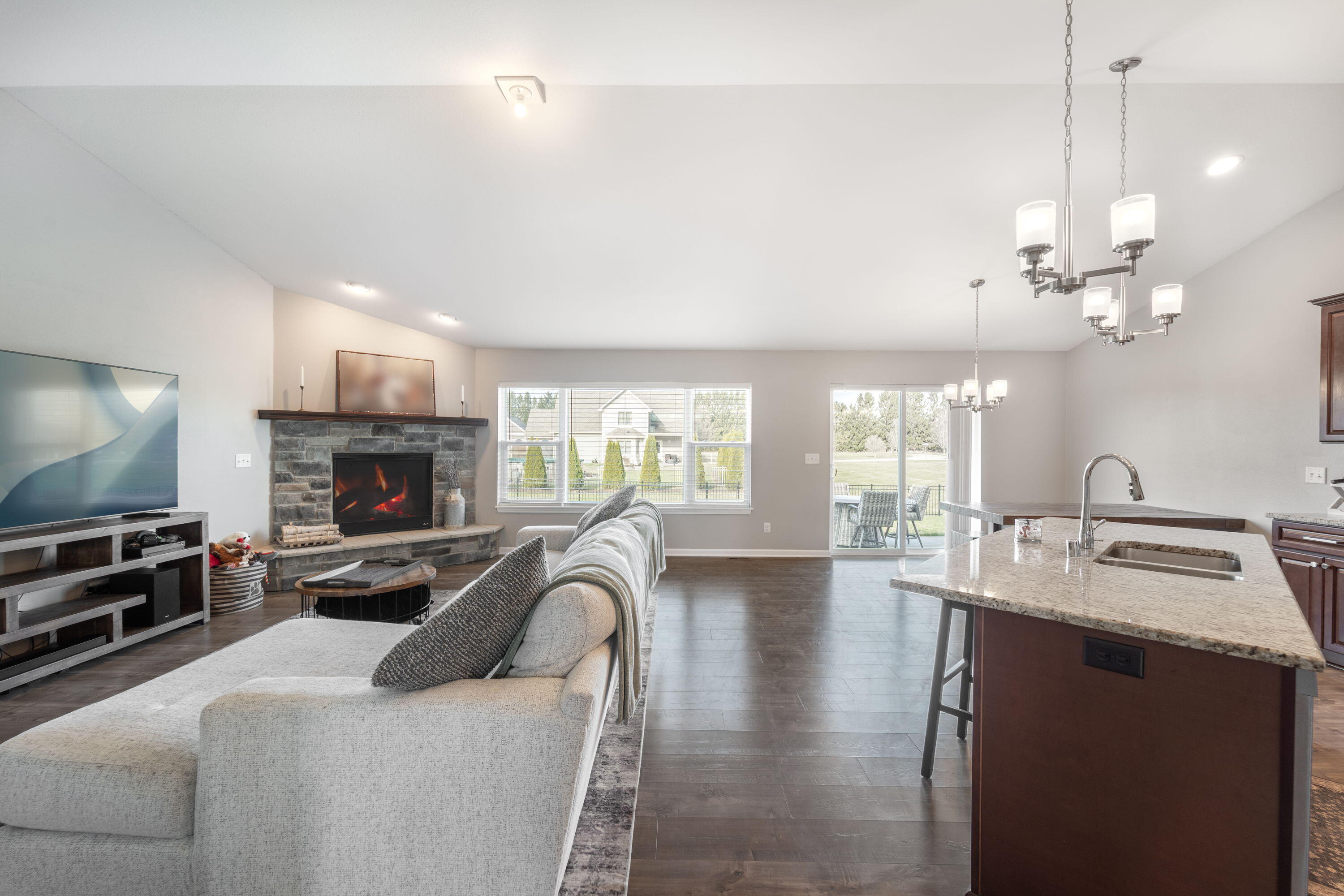 5202 Cornerstone Way Mount Pleasant, WI 53403 - Photo 20 of 29 Seamless flow between living, dining, and kitchen—perfect for entertaining