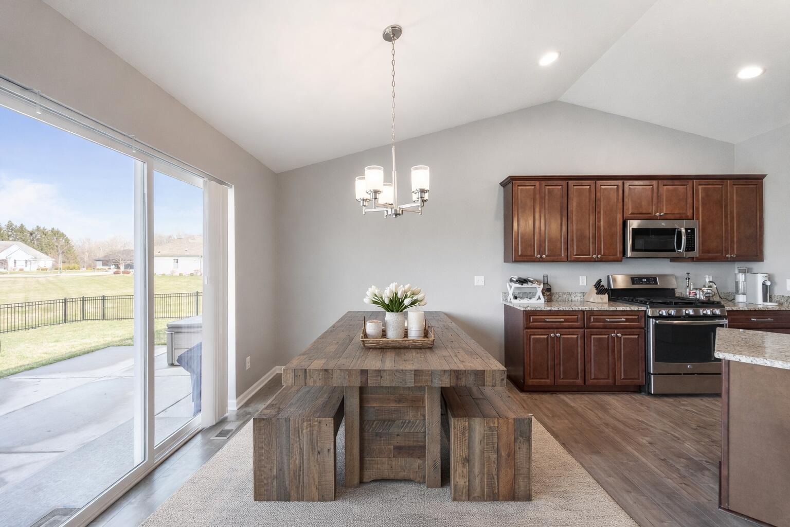 5202 Cornerstone Way Mount Pleasant, WI 53403 - Photo 5 of 29 Sun-filled space overlooking backyard—ideal for everyday living