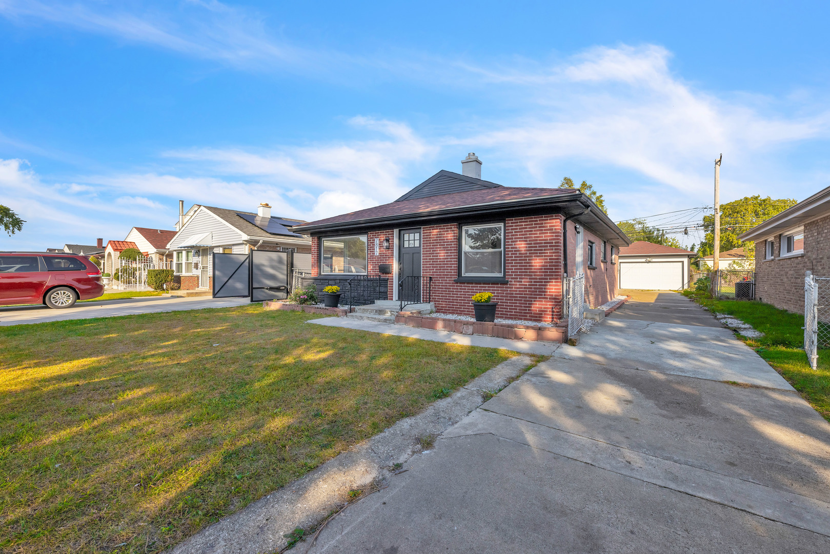 7817 South Kenton Avenue Chicago, IL 60652 - Photo 2 of 29 a view of a house with swimming pool yard and sitting area
