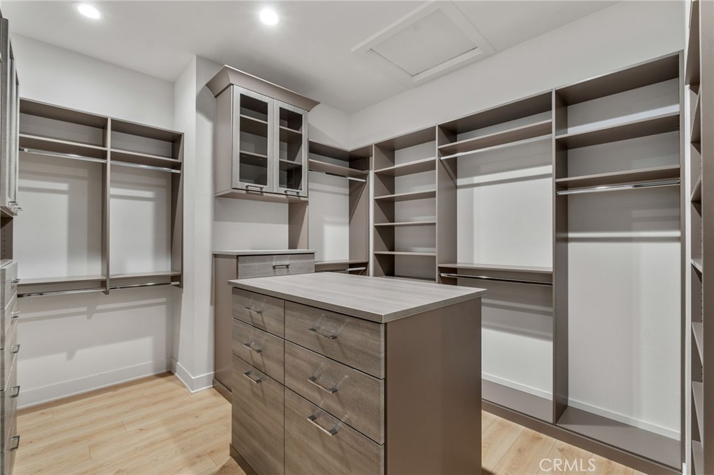 20637 West Hummingbird Porter Ranch Porter Ranch, CA 91326 - Photo 33 of 53 a kitchen with a sink and a refrigerator