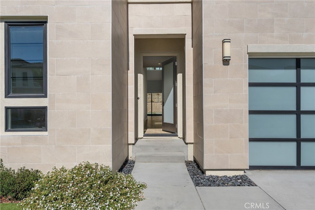 20637 West Hummingbird Porter Ranch Porter Ranch, CA 91326 - Photo 4 of 53 a view of a entryway door of the house