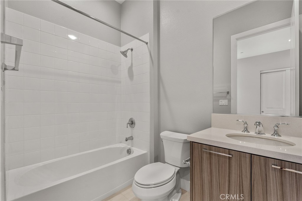 20637 West Hummingbird Porter Ranch Porter Ranch, CA 91326 - Photo 41 of 53 a bathroom with a sink a toilet and a bathtub