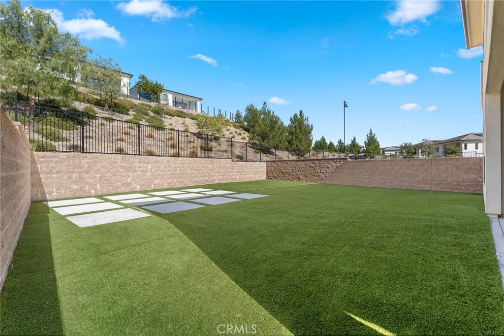 20637 West Hummingbird Porter Ranch Porter Ranch, CA 91326 - Photo 48 of 53 a view of yard with swimming pool and outdoor seating