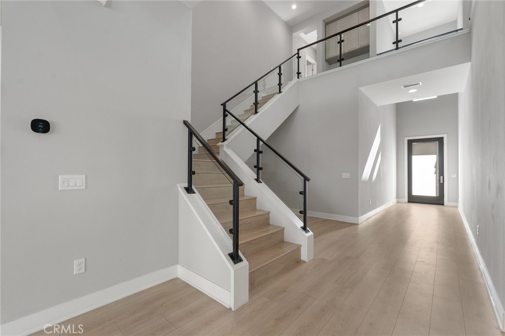 20637 West Hummingbird Porter Ranch Porter Ranch, CA 91326 - Photo 5 of 53 a view of entryway and hall with wooden floor