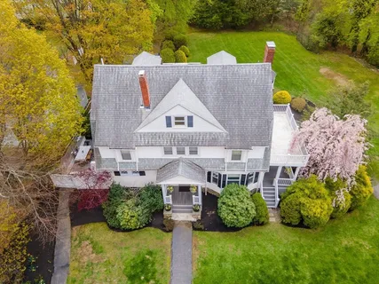 an aerial view of a house with garden