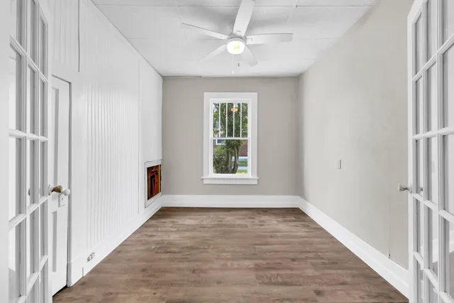 a view of an empty room with a window