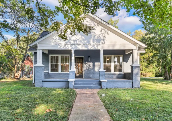 a front view of house with yard