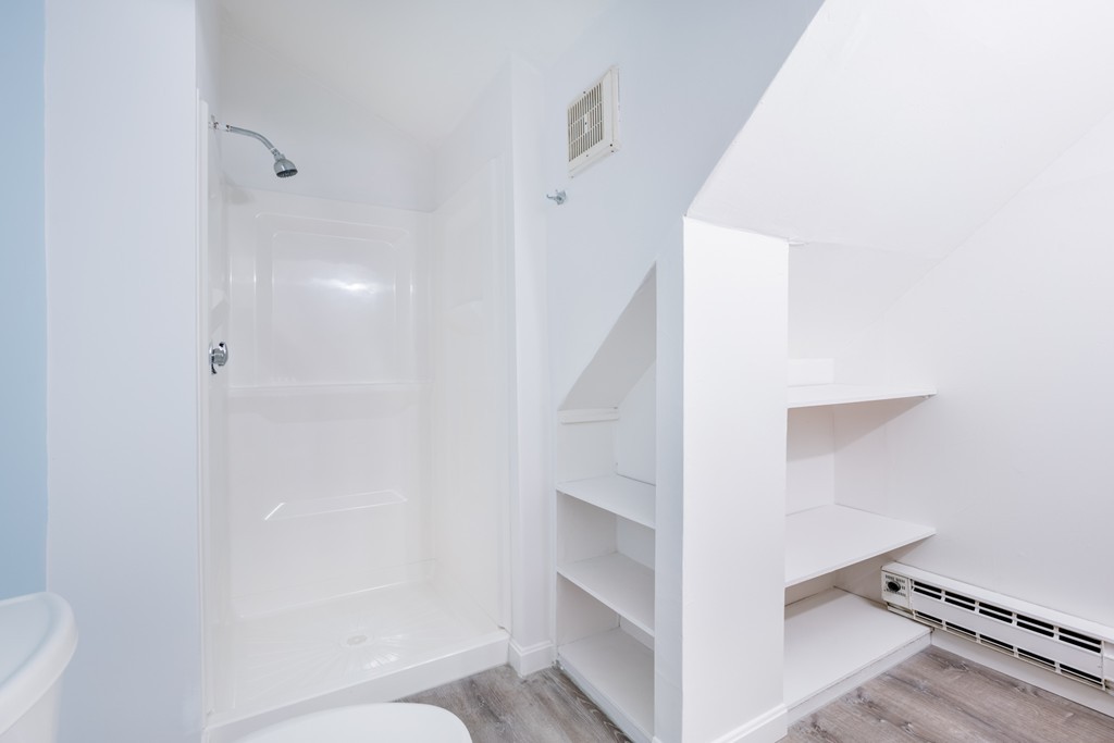 391 Concord Street Framingham, MA 01702 - Photo 19 of 27 a view of a hallway with closet