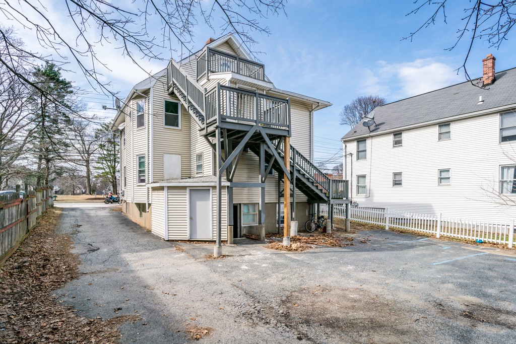 391 Concord Street Framingham, MA 01702 - Photo 24 of 27 a view of a house with a park