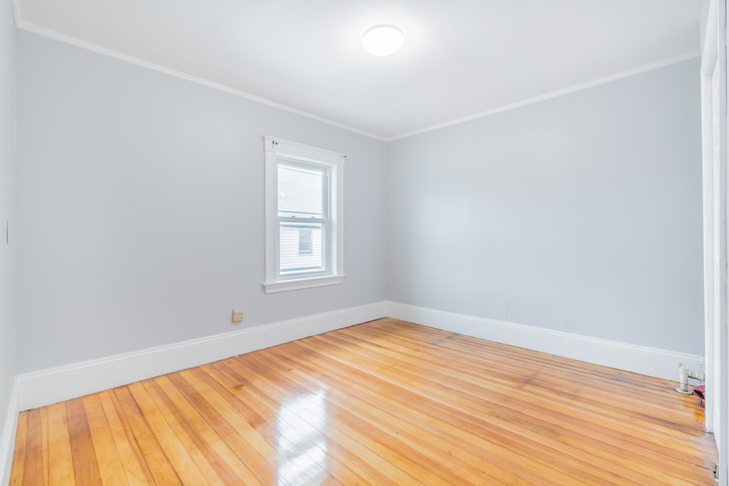 391 Concord Street Framingham, MA 01702 - Photo 4 of 27 a view of empty room with wooden floor