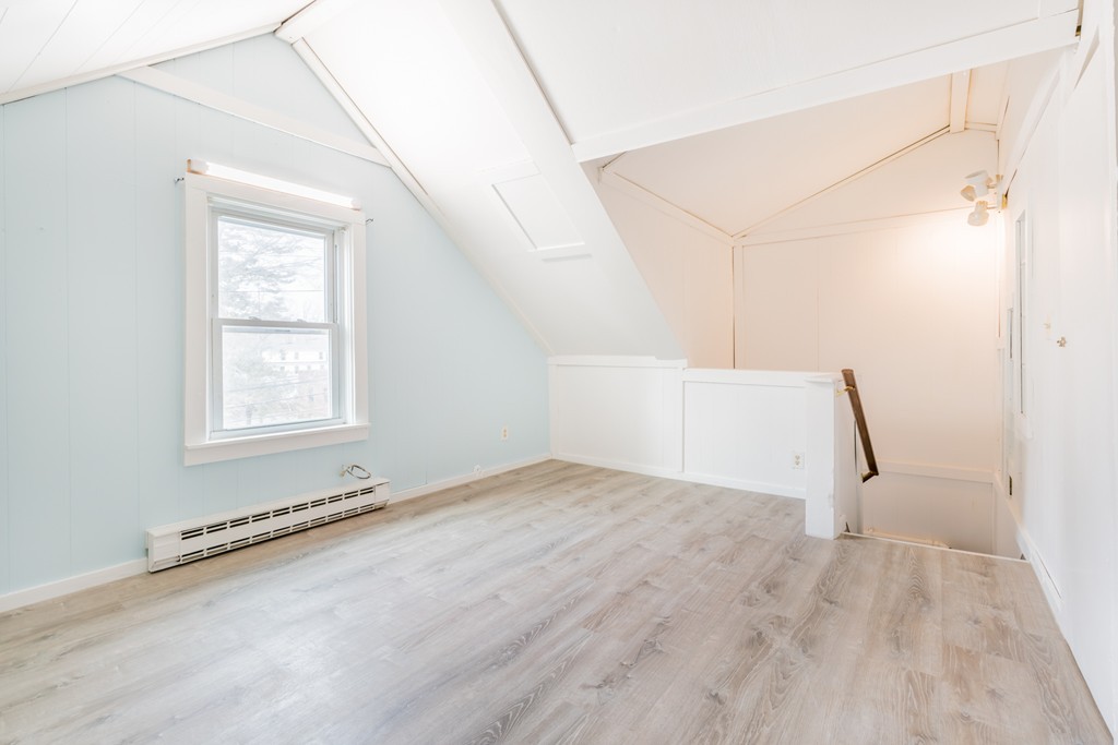 391 Concord Street Framingham, MA 01702 - Photo 7 of 27 a view of an empty room with a window