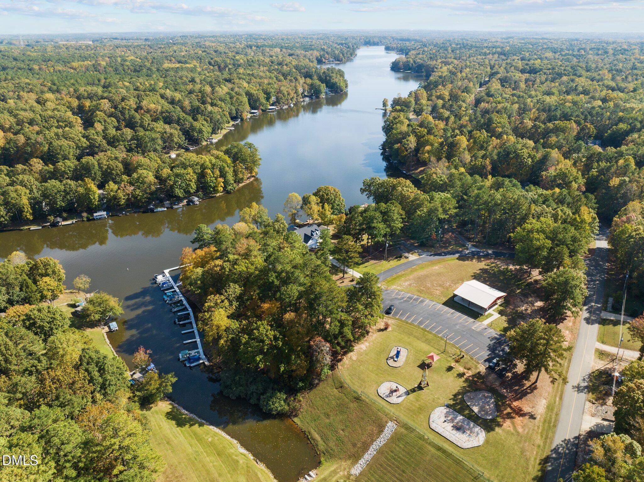 131 Catoose Drive Spring Hope, NC 27882 - Photo 26 of 39 an aerial view of a houses with a lake view